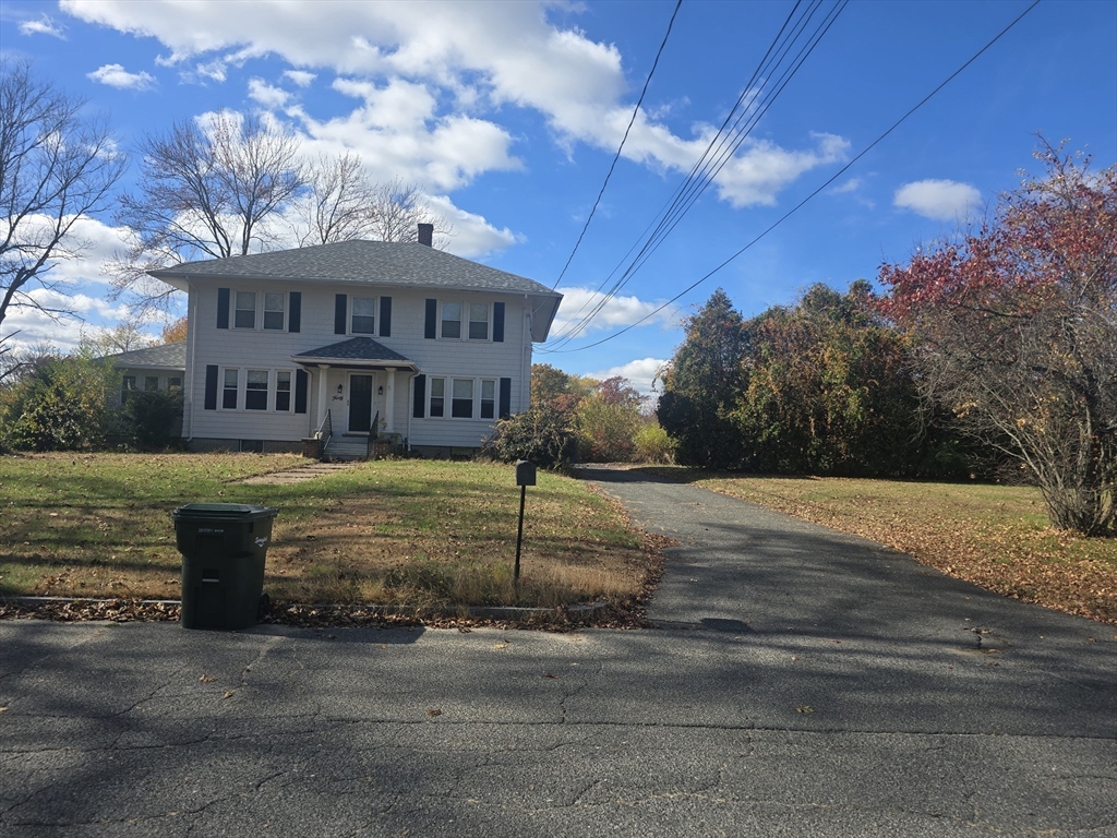 40 Catalpa Terrace Springfield, MA 01119 - Photo 2 of 24 a front view of a house with a yard