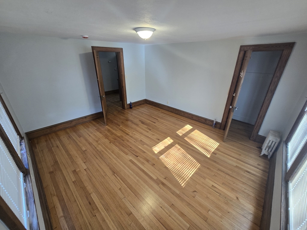 40 Catalpa Terrace Springfield, MA 01119 - Photo 22 of 24 a view of empty room with wooden floor