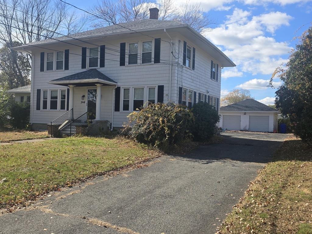 40 Catalpa Terrace Springfield, MA 01119 - Photo 3 of 24 a front view of a house with garden