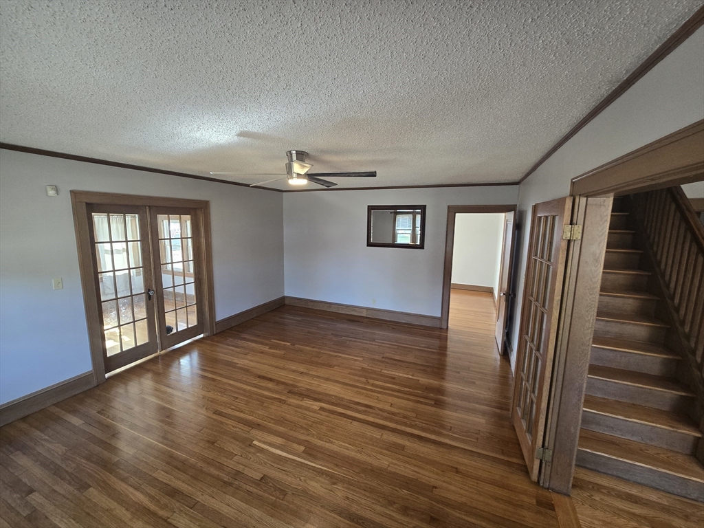 40 Catalpa Terrace Springfield, MA 01119 - Photo 5 of 24 wooden floor in an empty room with a window