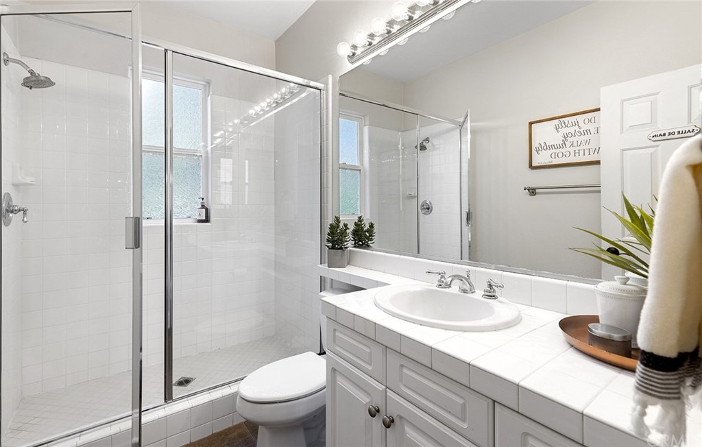6 Pomegranate Street Ladera Ranch, CA 92694 - Photo 20 of 40 a living room with furniture and a floor to ceiling window