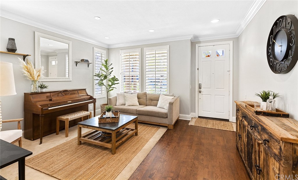 6 Pomegranate Street Ladera Ranch, CA 92694 - Photo 3 of 40 a vase of flowers sitting in front of a building