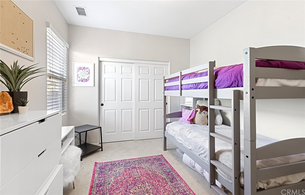 6 Pomegranate Street Ladera Ranch, CA 92694 - Photo 24 of 40 a bathroom with a granite countertop sink and a mirror
