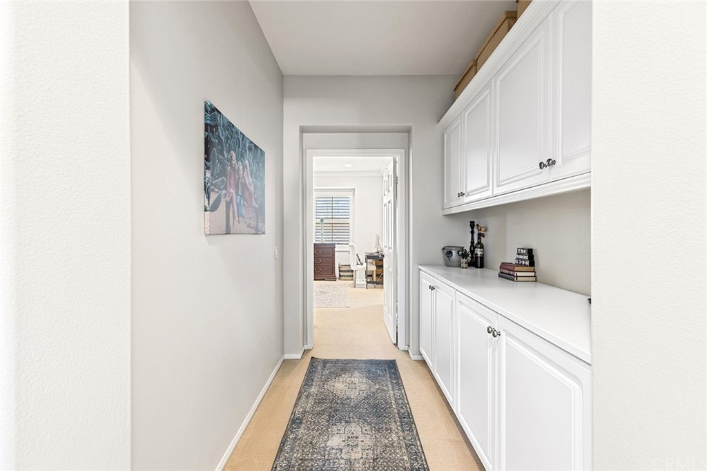 6 Pomegranate Street Ladera Ranch, CA 92694 - Photo 25 of 40 a bedroom with a bed and a couch