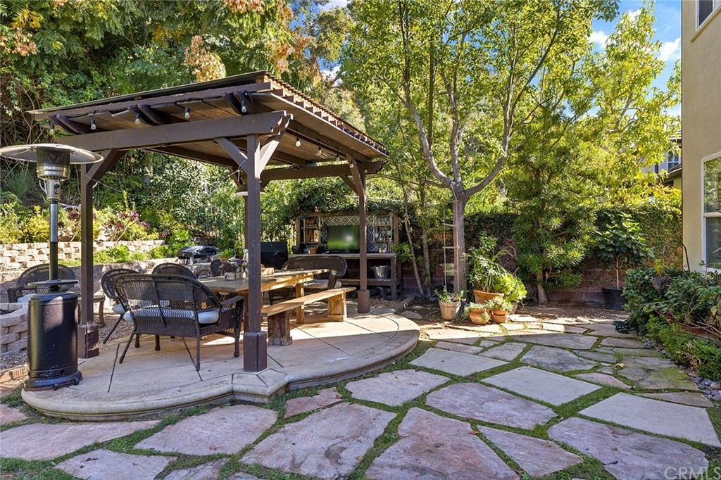 6 Pomegranate Street Ladera Ranch, CA 92694 - Photo 30 of 40 a view of outdoor space yard deck patio and swimming pool