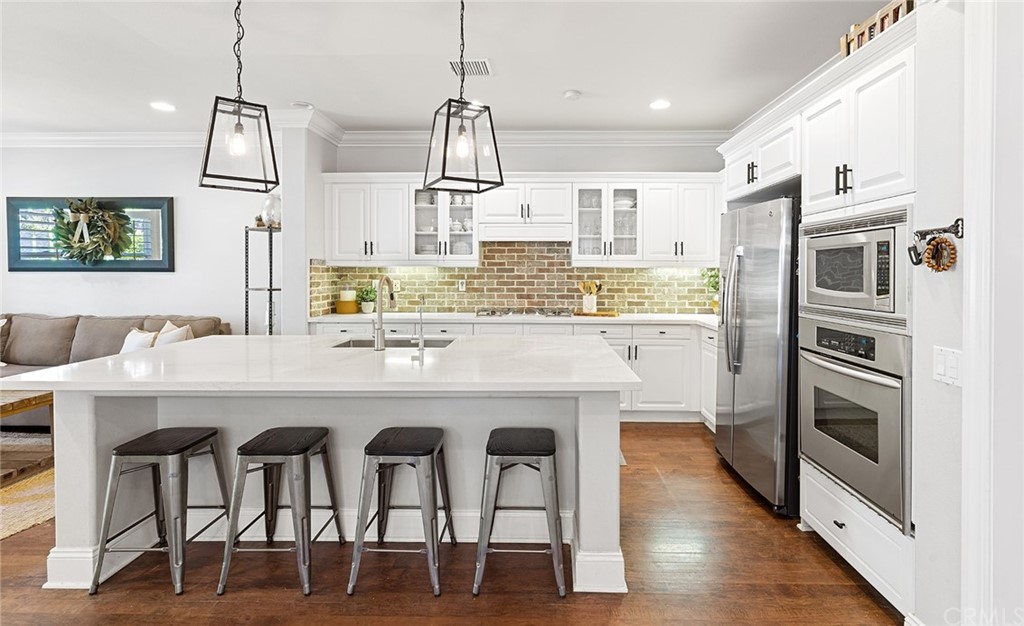 6 Pomegranate Street Ladera Ranch, CA 92694 - Photo 4 of 40 a living room with furniture and a piano