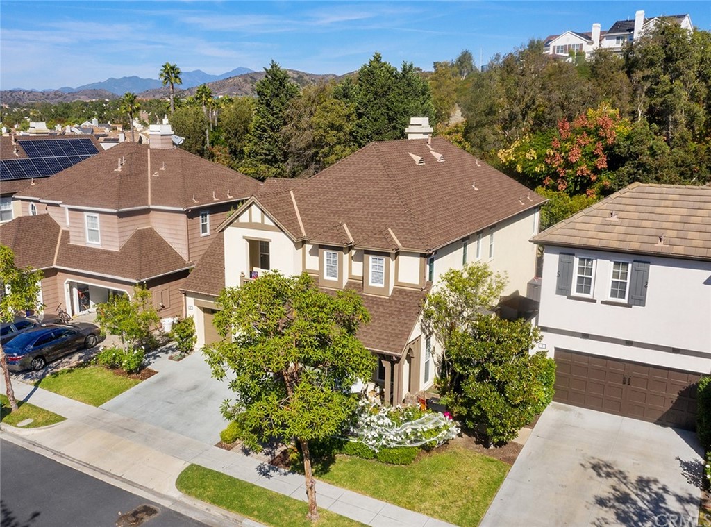 6 Pomegranate Street Ladera Ranch, CA 92694 - Photo 32 of 40 a front view of a house with a garden