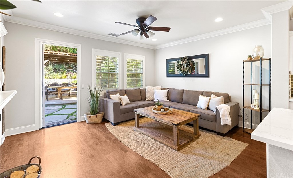 6 Pomegranate Street Ladera Ranch, CA 92694 - Photo 9 of 40 a kitchen with stainless steel appliances a sink and cabinets