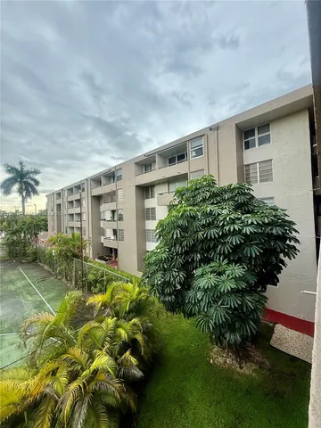 a view of a lake with a big yard