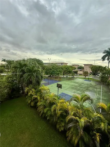 a view of a lake with a big yard