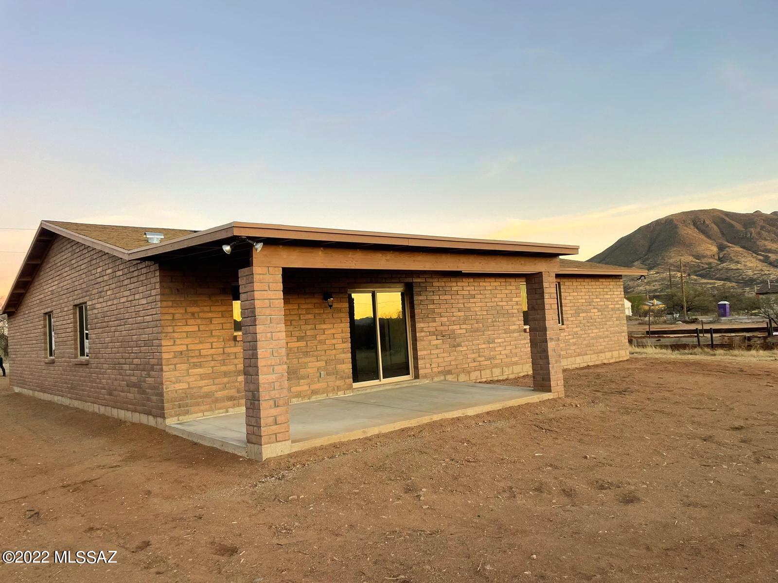 1850 Isabel Court Rio Rico, AZ 85648 - Photo 2 of 7 a view of a house with a garage