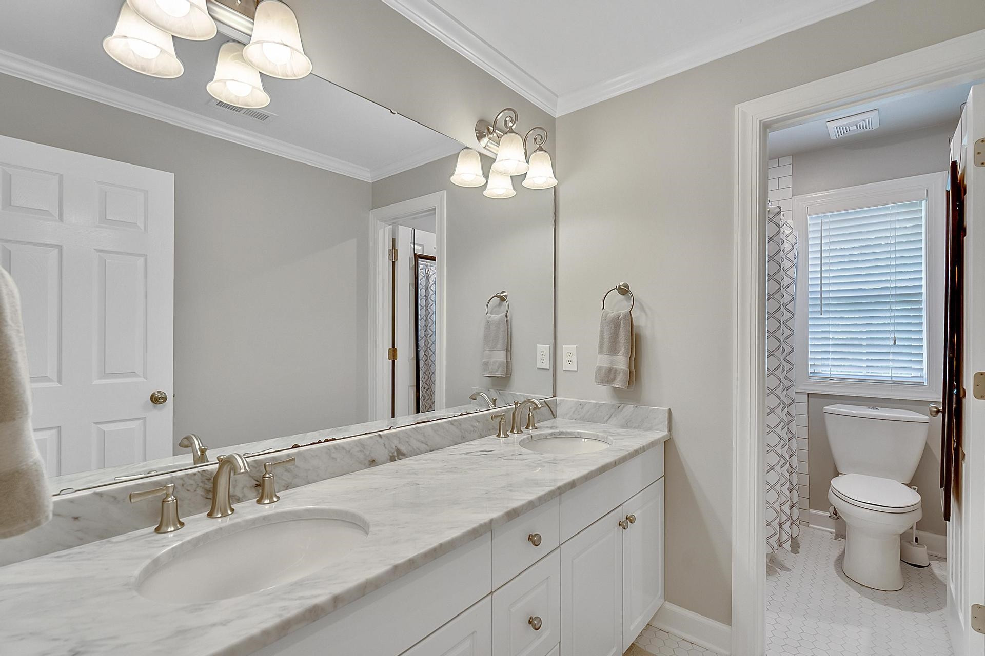 7905 Ocoee Court Raleigh, NC 27612 - Photo 26 of 55 Updated Hall Bathroom