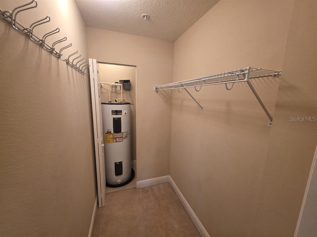 7070 Key Haven Road, Unit 402 Seminole, FL 33777 - Photo 29 of 34 a view of walk in closet