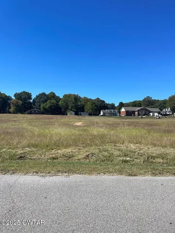 a view of a lake with mountain in the background