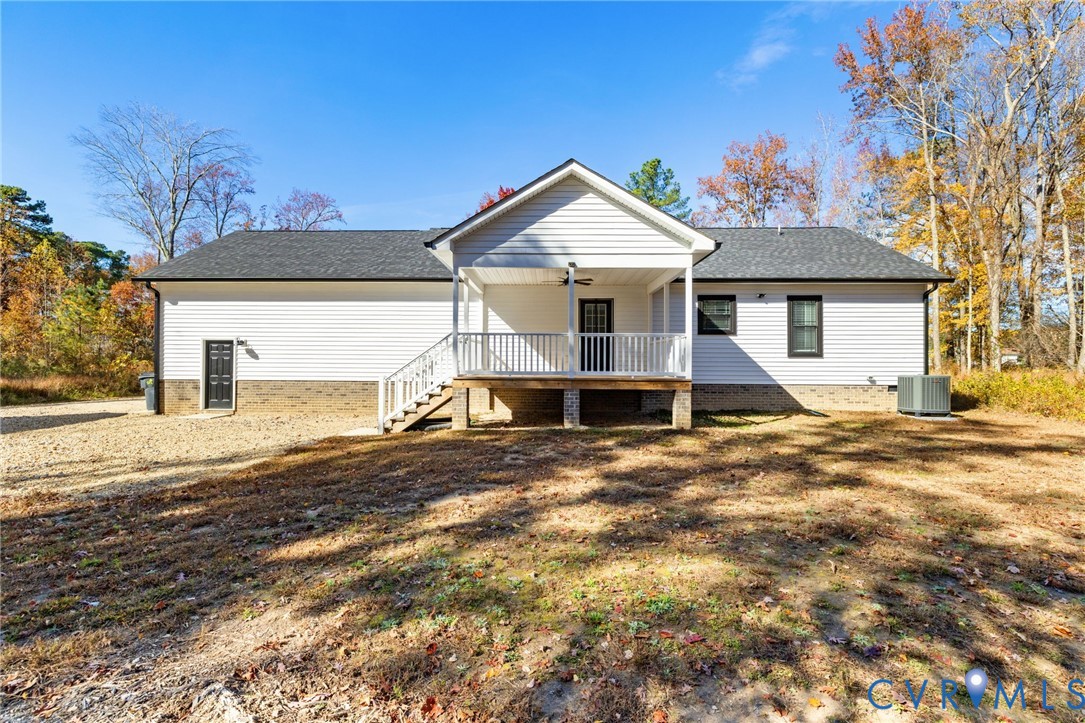13545 Prince George Drive Disputanta, VA 23842 - Photo 18 of 18 View of front facade with ceiling fan and roof wit