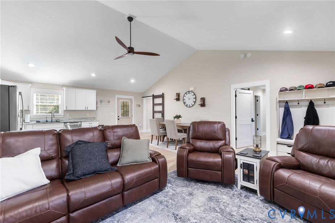 13545 Prince George Drive Disputanta, VA 23842 - Photo 4 of 18 Living room with a barn door, recessed lighting, a