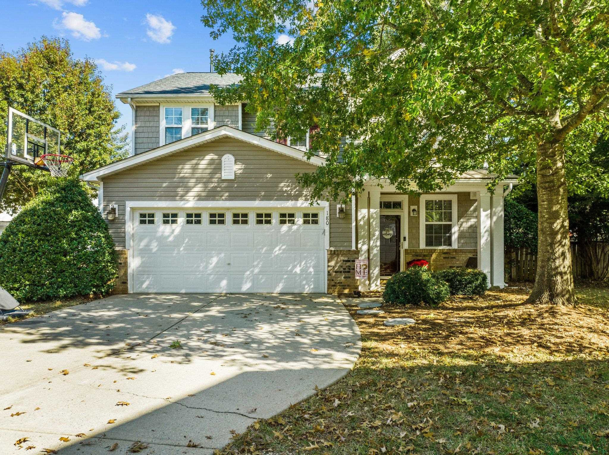 180 Solheim Lane Raleigh, NC 27603 - Photo 1 of 39 a front view of a house with a yard