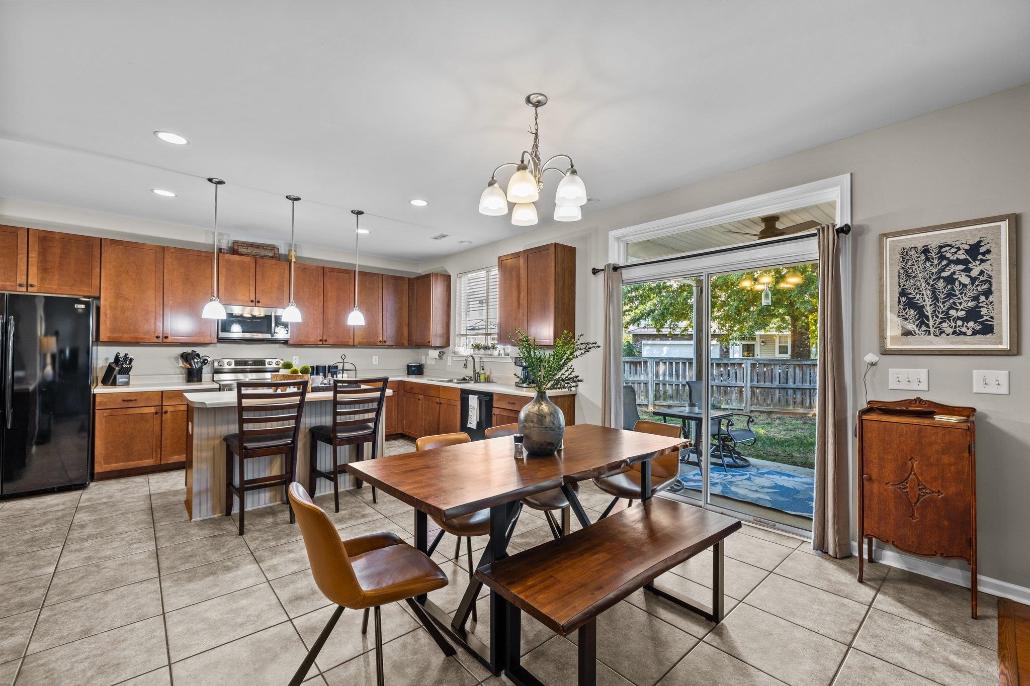 180 Solheim Lane Raleigh, NC 27603 - Photo 12 of 39 a view of a dining room with furniture window and outside view