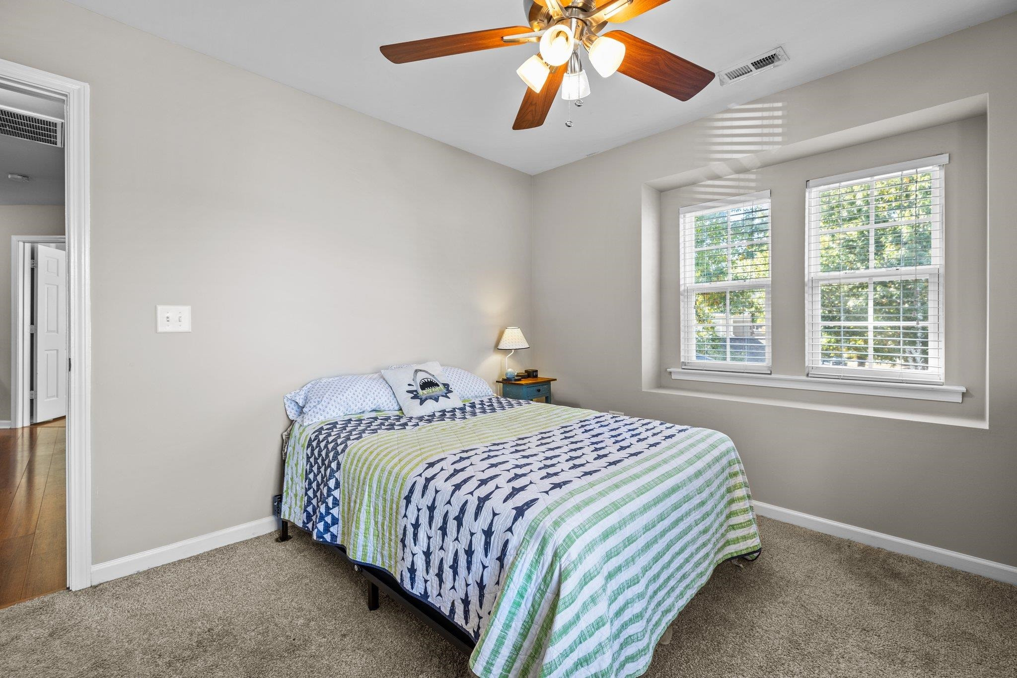 180 Solheim Lane Raleigh, NC 27603 - Photo 23 of 39 a bedroom with a bed and window