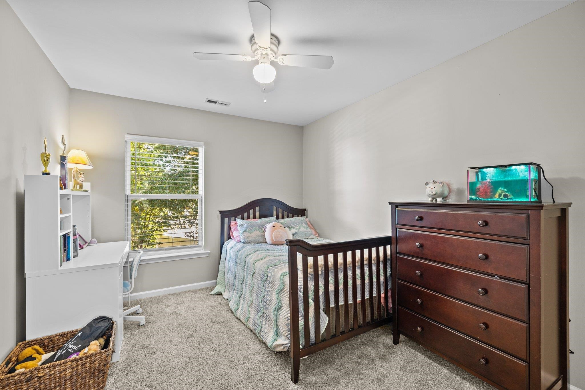 180 Solheim Lane Raleigh, NC 27603 - Photo 24 of 39 a bedroom with a bed and a window