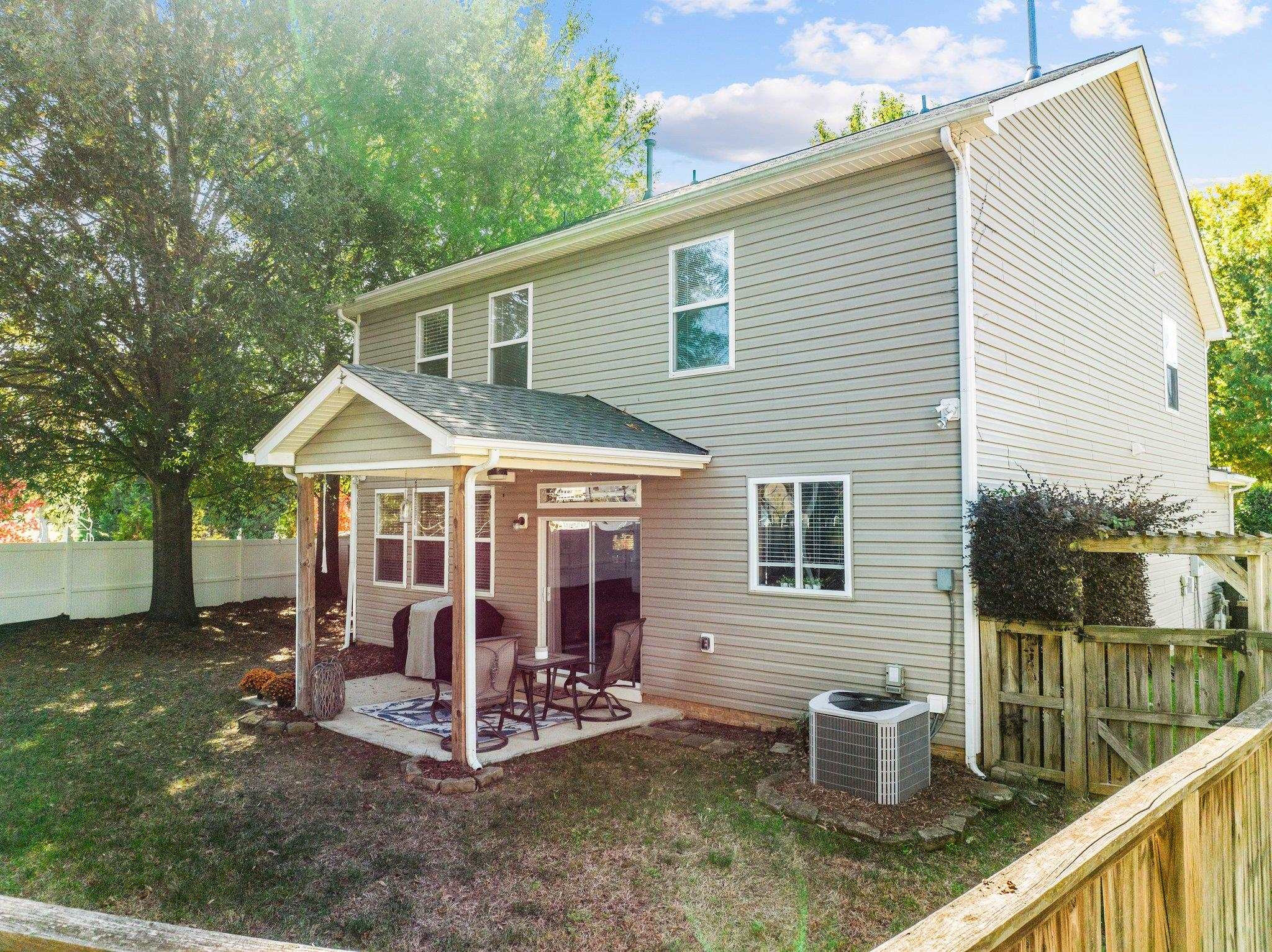 180 Solheim Lane Raleigh, NC 27603 - Photo 30 of 39 a view of a house with a yard and patio