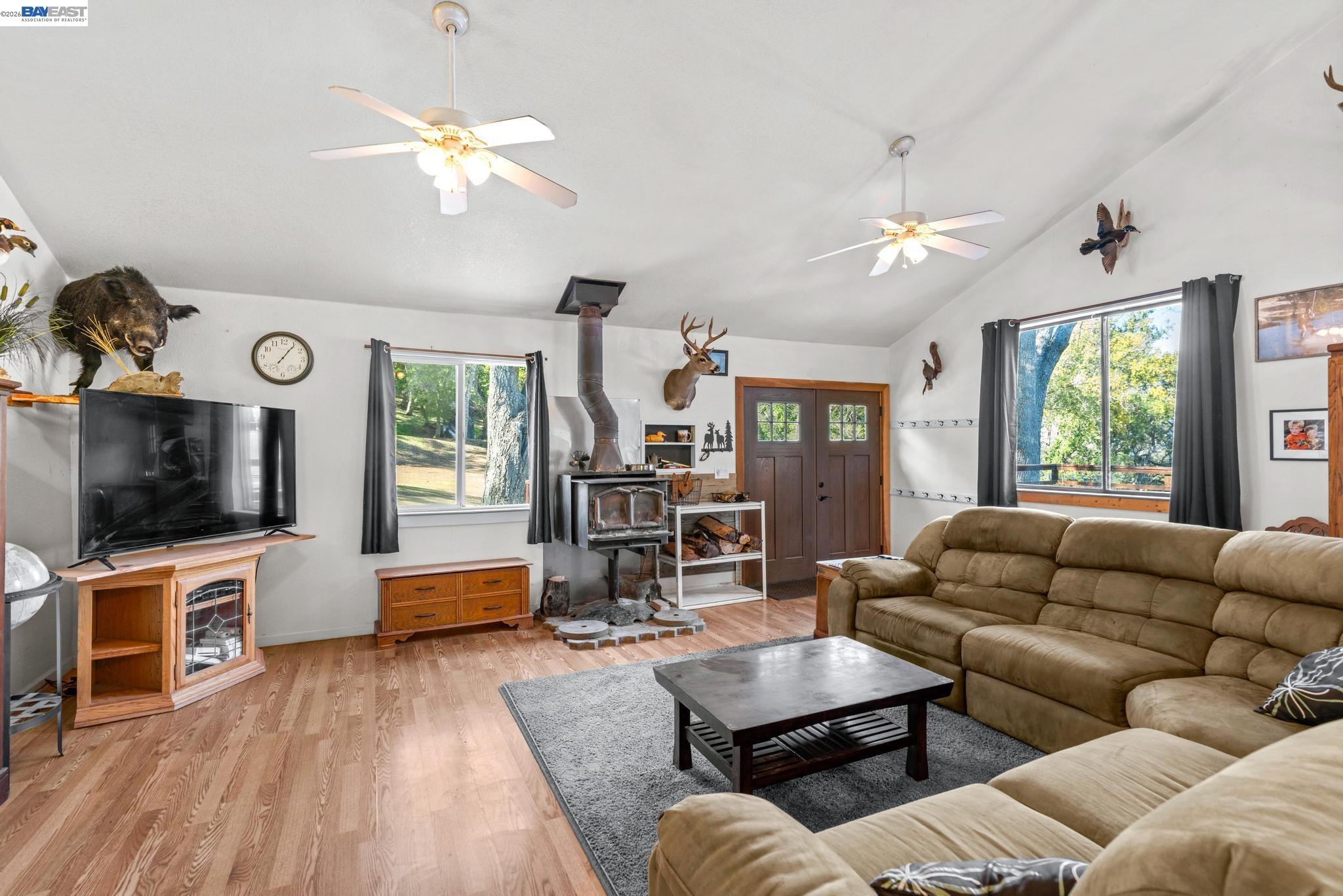7777 Del Valle Road Livermore, CA 94550 - Photo 14 of 60 a living room with furniture and a flat screen tv
