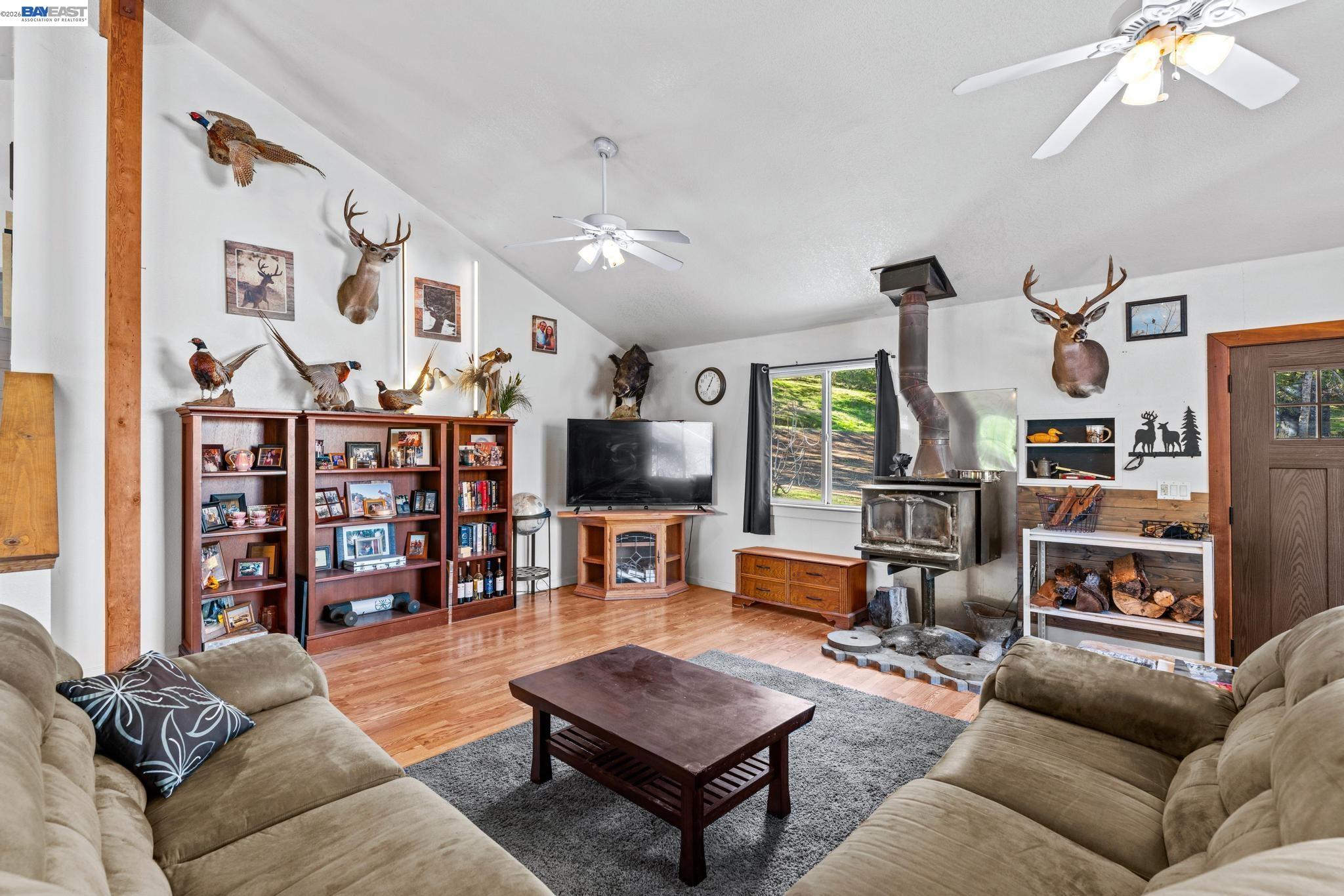 7777 Del Valle Road Livermore, CA 94550 - Photo 16 of 60 a living room with furniture and wooden floor