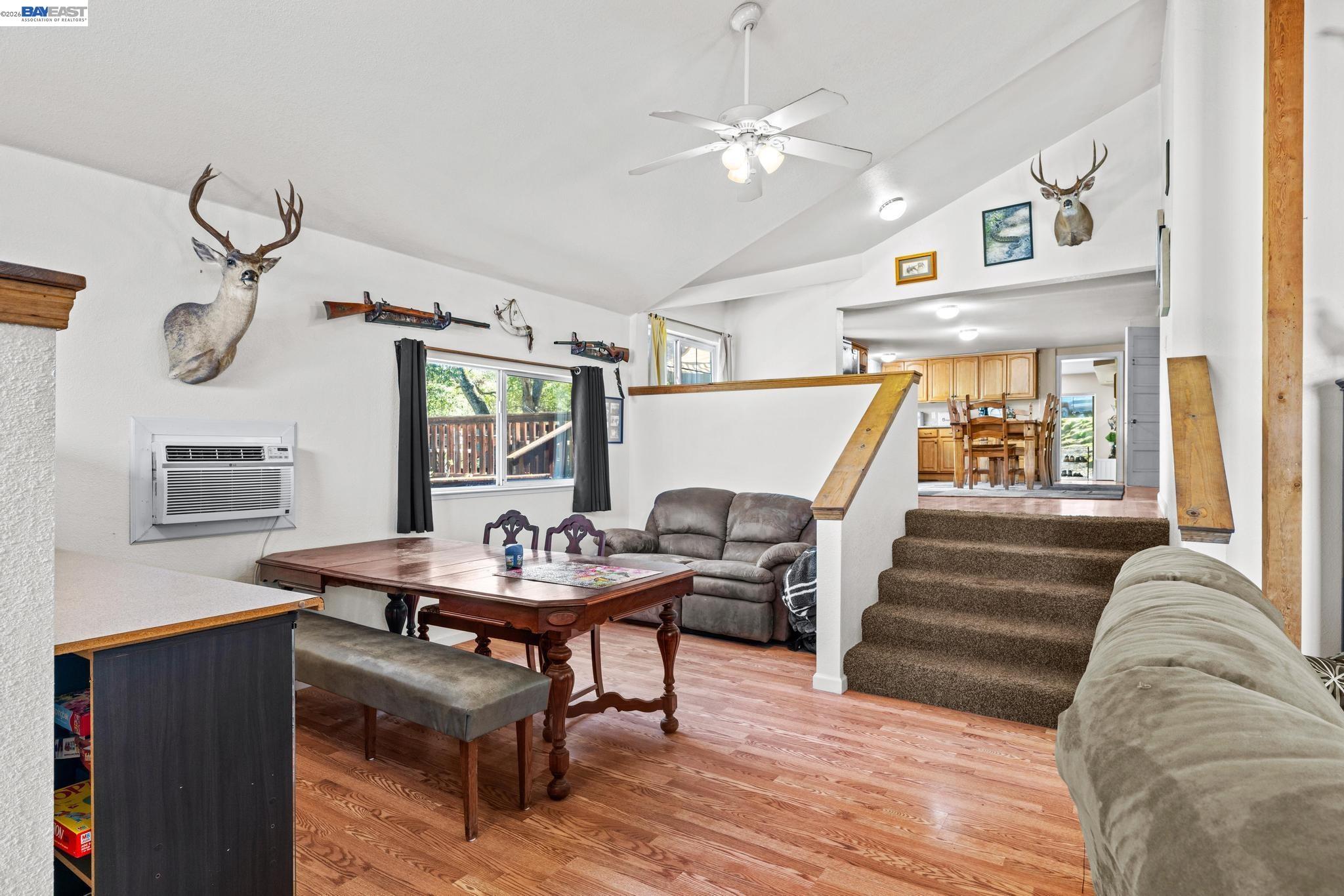 7777 Del Valle Road Livermore, CA 94550 - Photo 17 of 60 a living room with furniture and a wooden floor