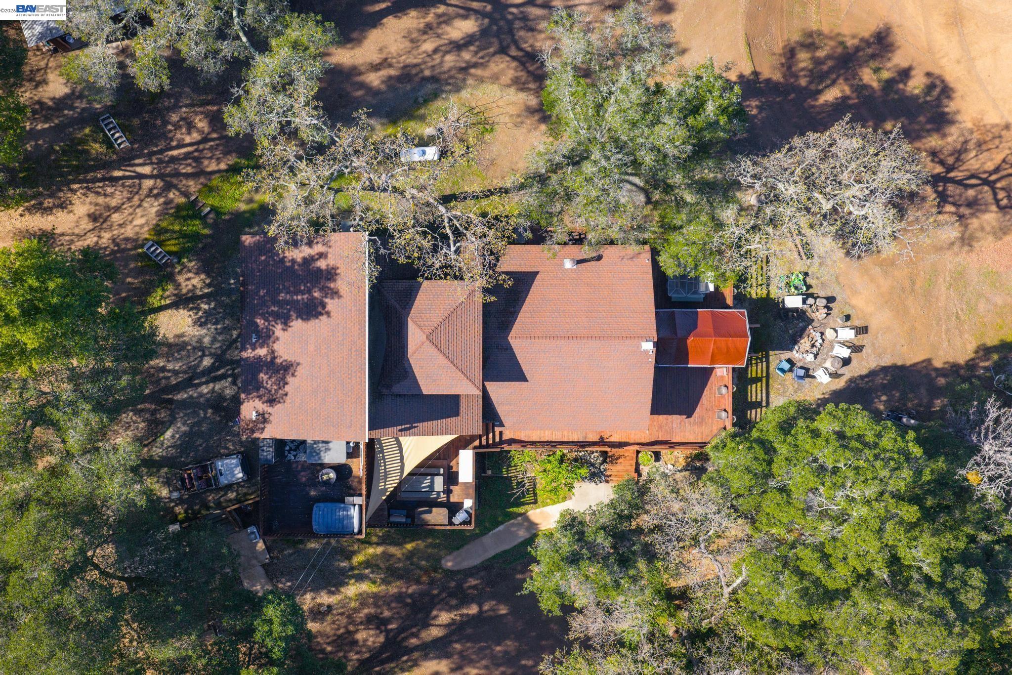7777 Del Valle Road Livermore, CA 94550 - Photo 3 of 60 an aerial view of a house with outdoor space and trees all around
