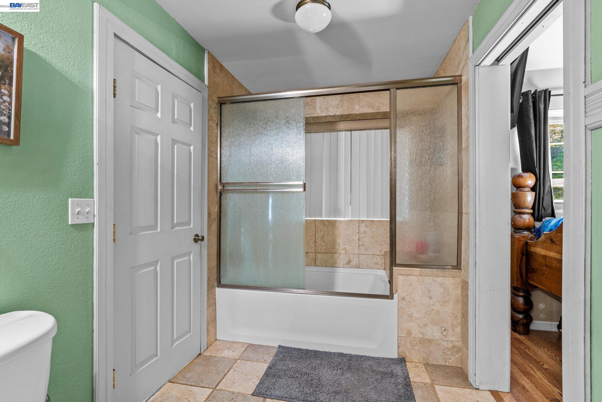 7777 Del Valle Road Livermore, CA 94550 - Photo 32 of 60 a bathroom with a shower and a toilet