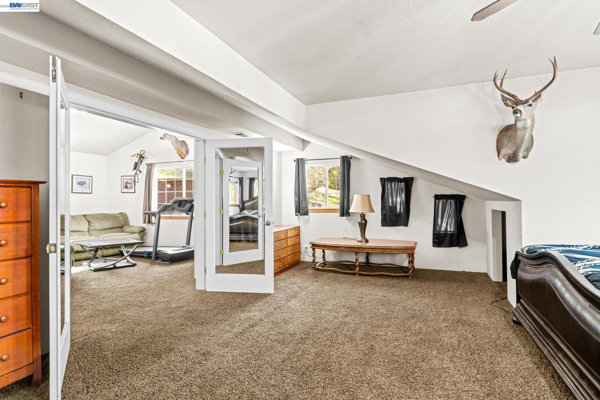 7777 Del Valle Road Livermore, CA 94550 - Photo 37 of 60 a living room with furniture gym equipment and view of living room