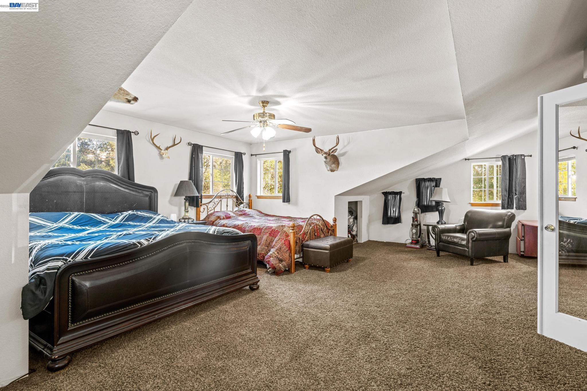 7777 Del Valle Road Livermore, CA 94550 - Photo 38 of 60 a living room with furniture and a chandelier
