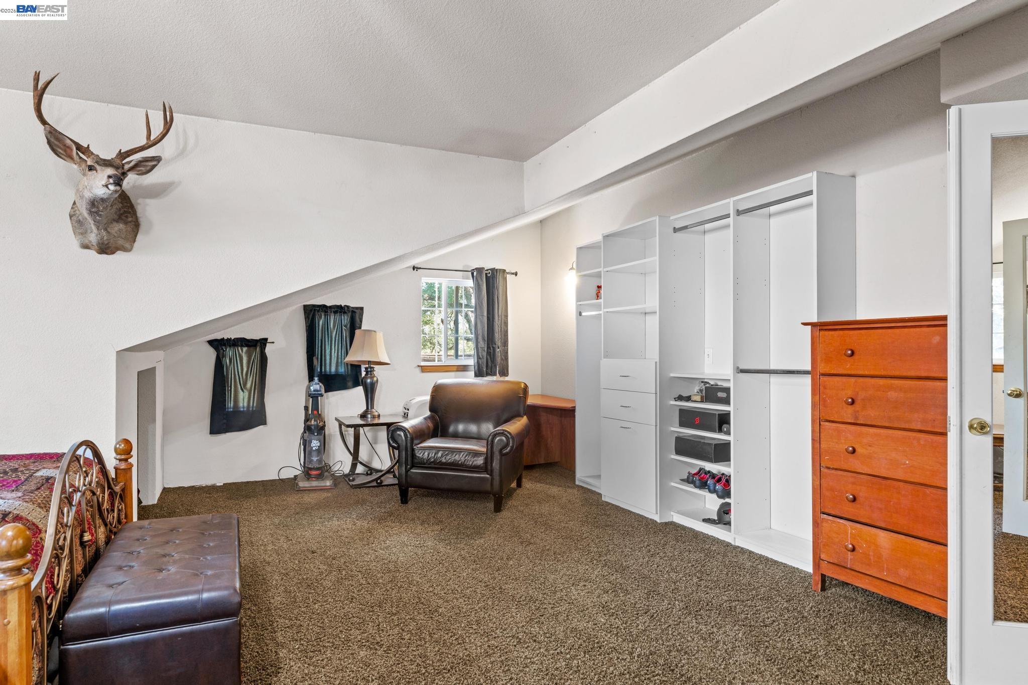 7777 Del Valle Road Livermore, CA 94550 - Photo 39 of 60 a living room with furniture and a flat screen tv