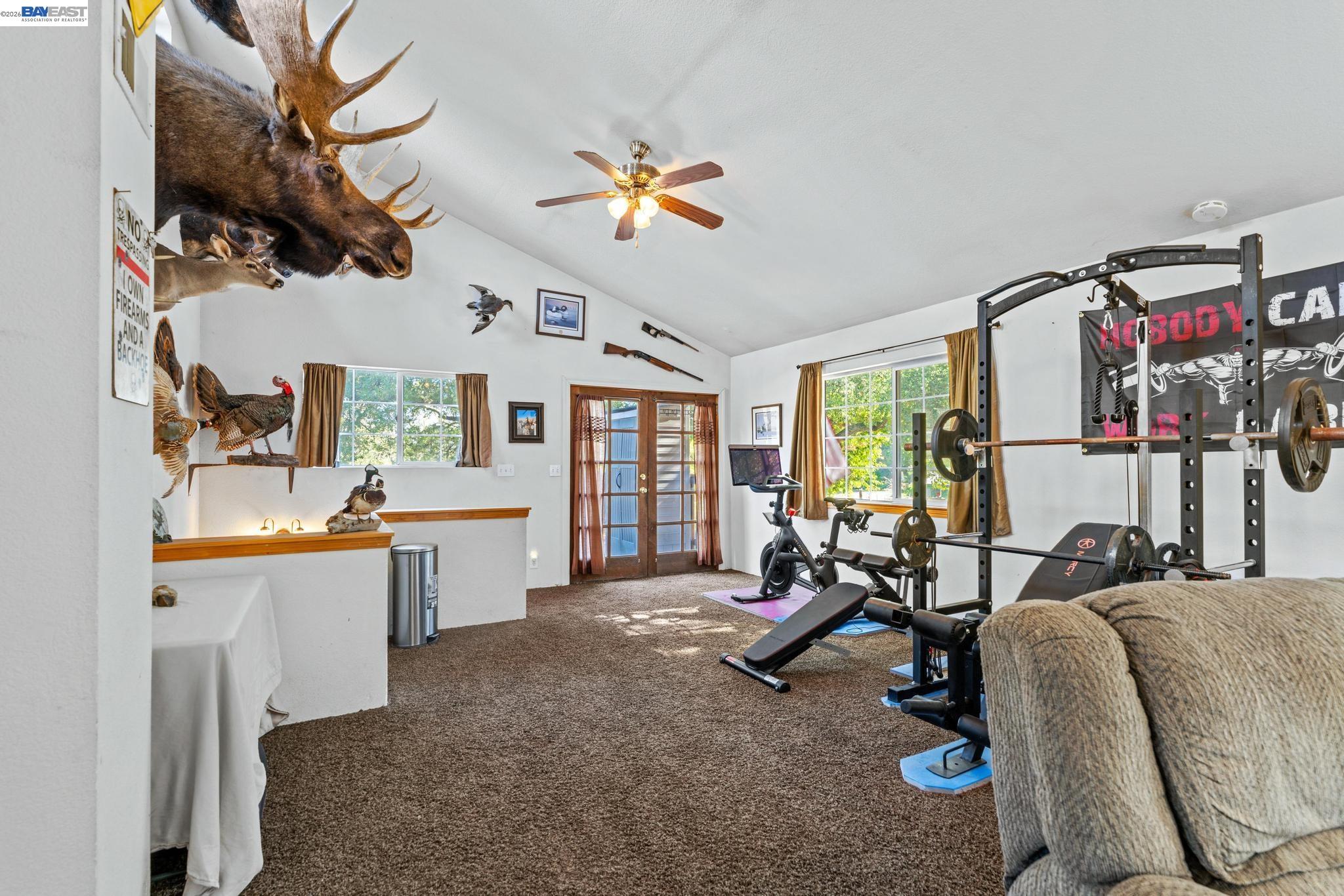 7777 Del Valle Road Livermore, CA 94550 - Photo 40 of 60 a living room with furniture a chandelier and a window