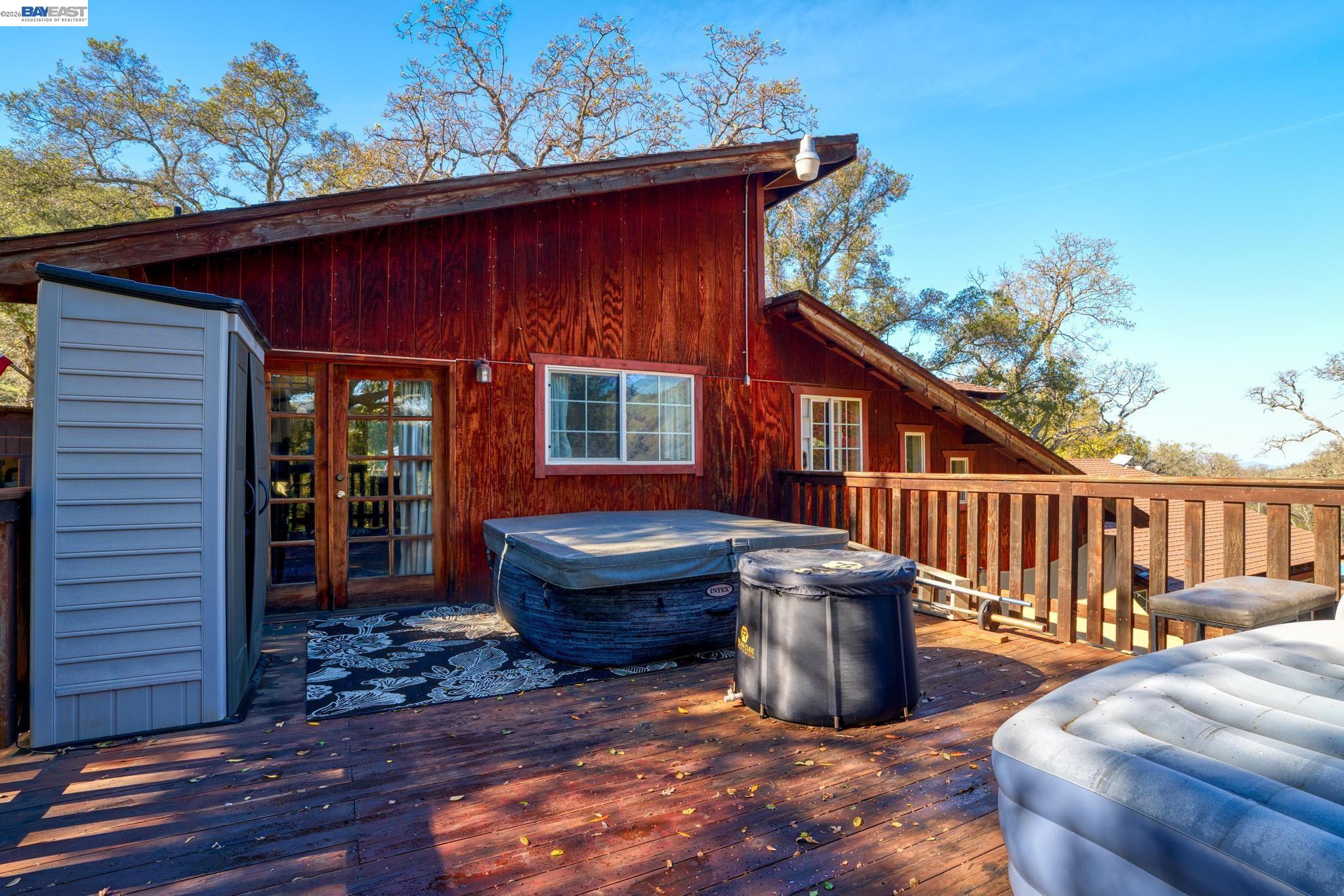 7777 Del Valle Road Livermore, CA 94550 - Photo 41 of 60 a view of house with backyard outdoor seating and wooden floor