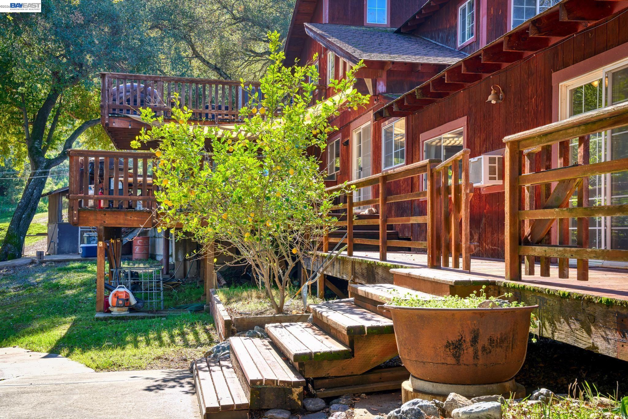 7777 Del Valle Road Livermore, CA 94550 - Photo 44 of 60 a view of a patio with couches table and chairs and potted plants
