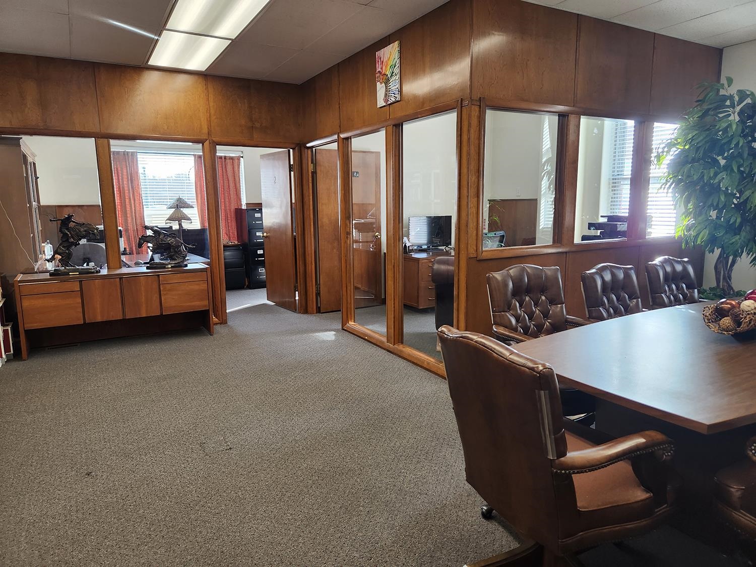 102 East Market Street Mount Carroll, IL 61053 - Photo 11 of 48 a living room with furniture and a chandelier