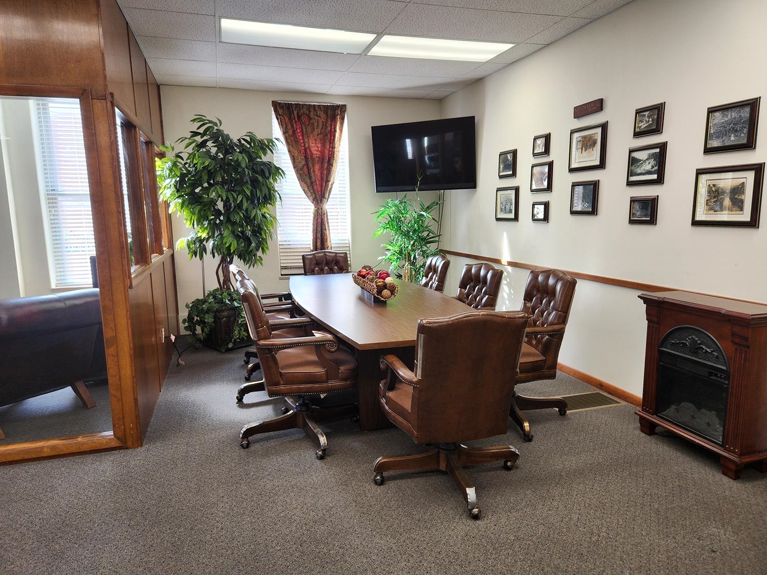 102 East Market Street Mount Carroll, IL 61053 - Photo 12 of 48 a view of a dining room with furniture and a potted plant