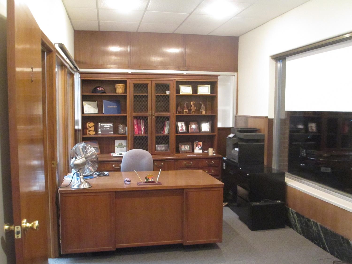 102 East Market Street Mount Carroll, IL 61053 - Photo 16 of 48 a room with stainless steel appliances wooden floor and view of kitchen