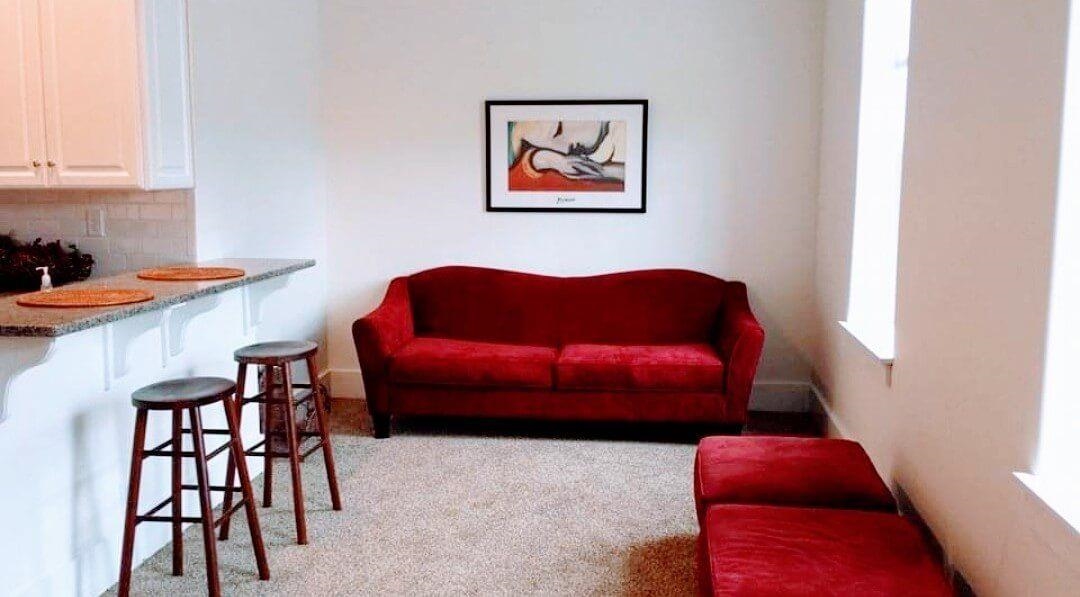 102 East Market Street Mount Carroll, IL 61053 - Photo 19 of 48 a room with furniture and a chair