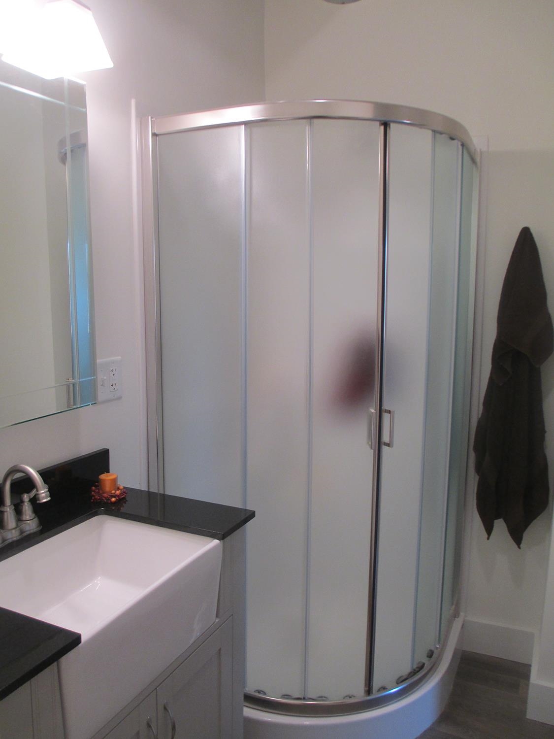 102 East Market Street Mount Carroll, IL 61053 - Photo 21 of 48 a bathroom with a sink and a mirror