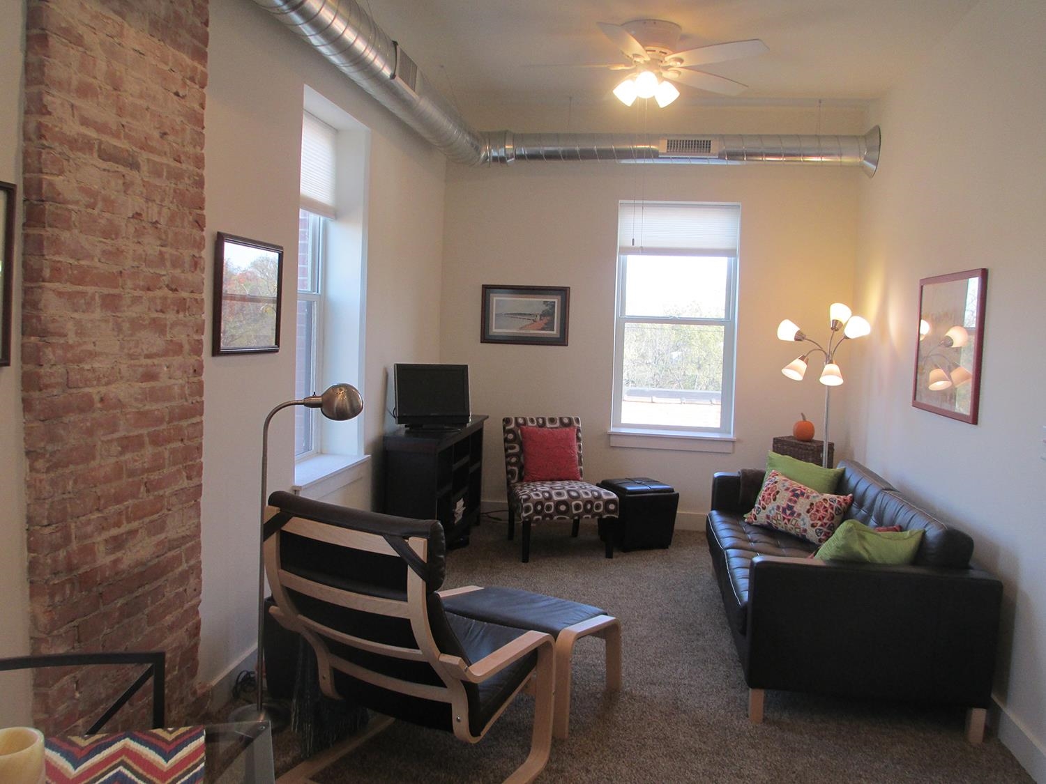 102 East Market Street Mount Carroll, IL 61053 - Photo 35 of 48 a living room with furniture and a window