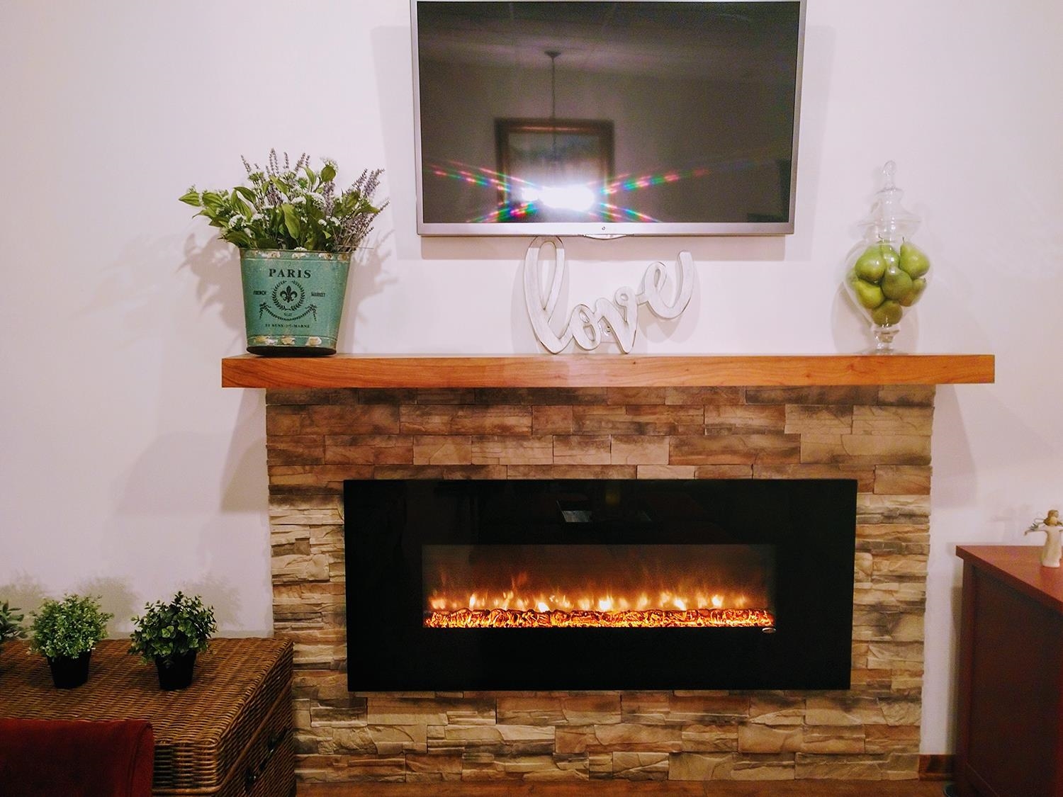 102 East Market Street Mount Carroll, IL 61053 - Photo 40 of 48 a close view of fireplace with a potted plant