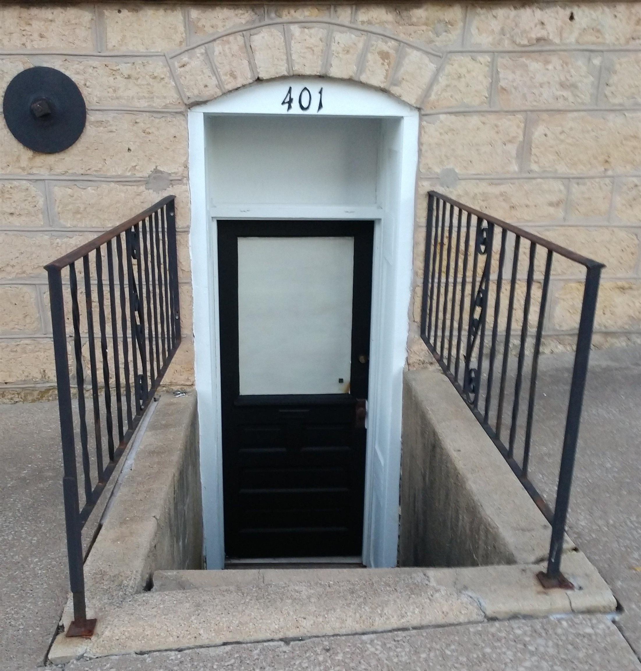 102 East Market Street Mount Carroll, IL 61053 - Photo 48 of 48 a view of a hallway with wooden floor and staircase