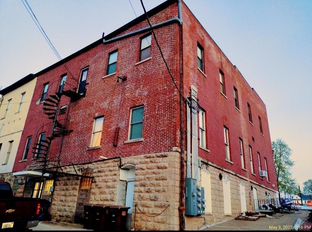 102 East Market Street Mount Carroll, IL 61053 - Photo 5 of 48 a front view of a building