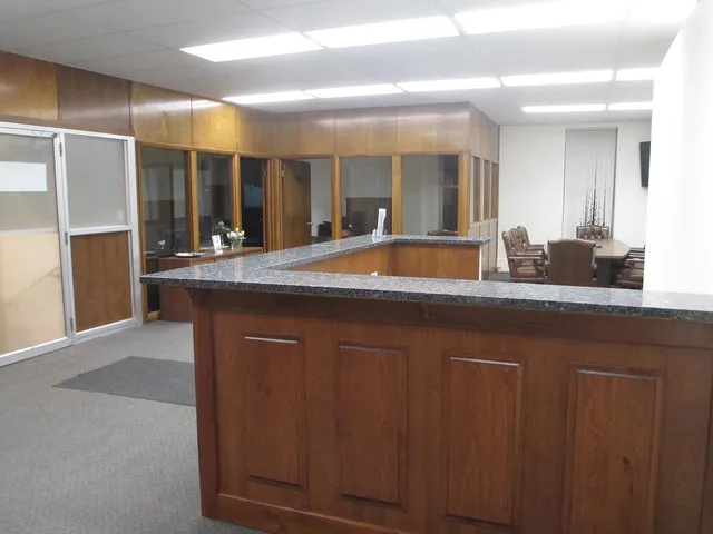a bathroom with a sink and a large mirror