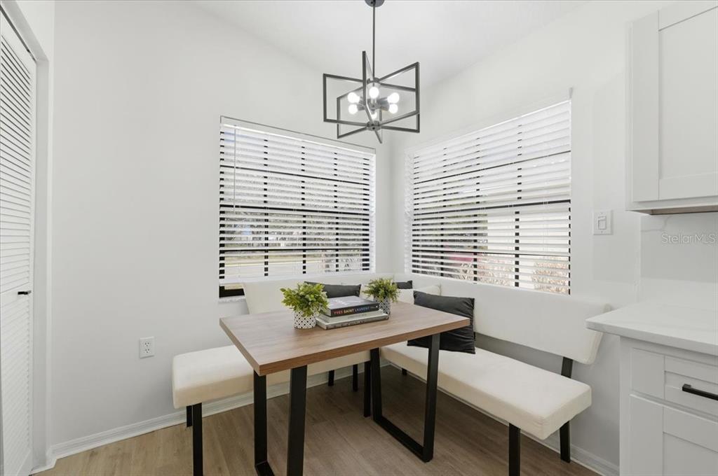 669 Eagle Run Lakeland, FL 33809 - Photo 12 of 69 a view of a room with a table and chairs