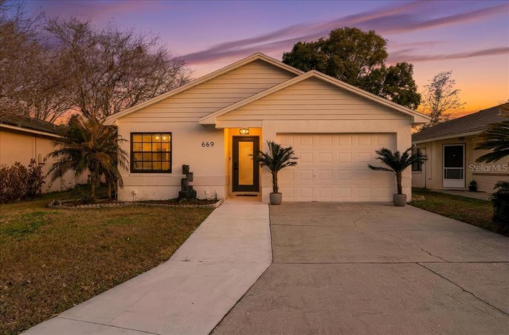 669 Eagle Run Lakeland, FL 33809 - Photo 2 of 69 a view of a house with a yard