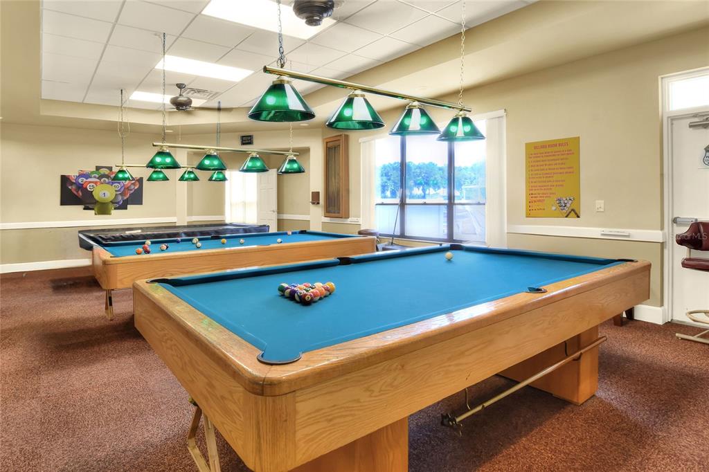 669 Eagle Run Lakeland, FL 33809 - Photo 46 of 69 a room with pool table and windows