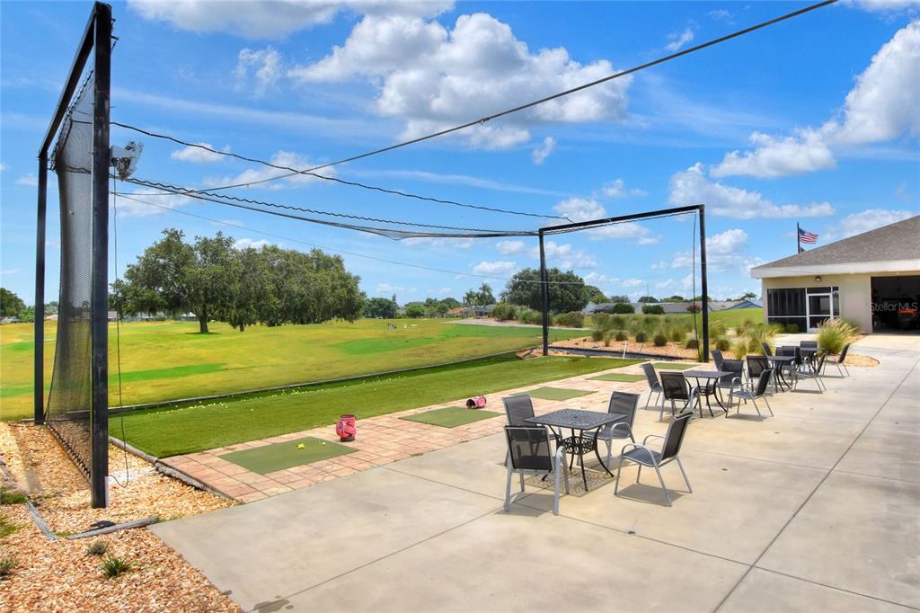 669 Eagle Run Lakeland, FL 33809 - Photo 59 of 69 a view of a swimming pool and outdoor seating